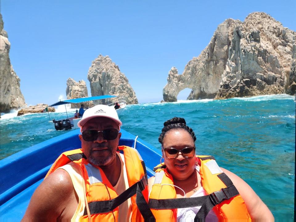 Victor Vickers and Monique Vickers traveling in Cabo San Lucas, Mexico, during a trip they booked with Travel by Kenya of Gainesville.