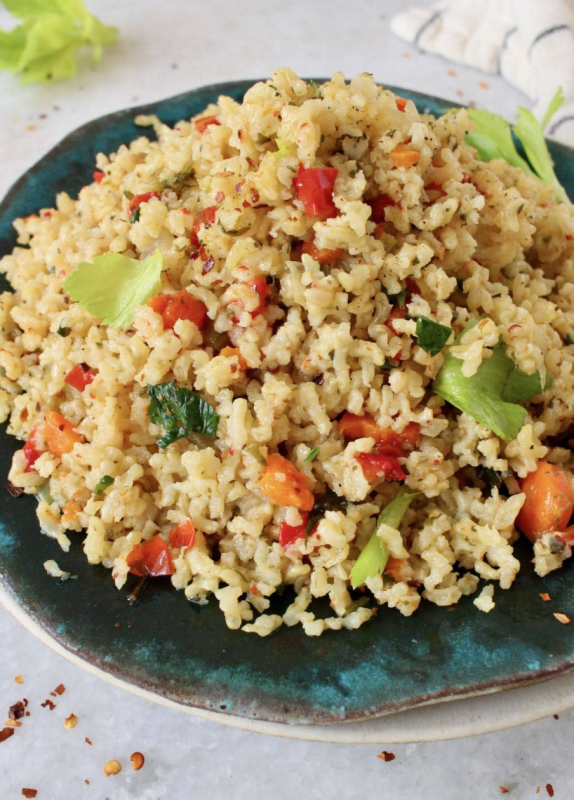 <p>Ciao Florentina</p><p>Healthy bell peppers, carrot, celery and onion alongside Italian parsley infuse this easy brown rice pilaf with a divine savory and herbaceous aroma.</p><p><strong>Get the recipe: <a href="https://ciaoflorentina.com/brown-rice-pilaf-recipe-video/" rel="nofollow noopener" target="_blank" data-ylk="slk:Brown Rice Pilaf;elm:context_link;itc:0;sec:content-canvas" class="link ">Brown Rice Pilaf</a></strong></p>