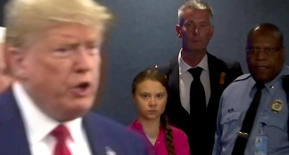 Greta Thunberg stares at Donald Trump.