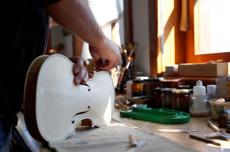 A replica of Antonio Stradivari's 'Huberman' violin in the making is seen at the shop of internationally recognised self-taught craftsman Svetozar Bogdanovski, in Veles