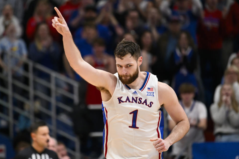 Kansas center Hunter Dickinson (1) celebrates a basket against TCU during the second half of an NCAA college basketball game in Lawrence, Kan., Saturday, Jan. 6, 2024. (AP Photo/Reed Hoffmann)