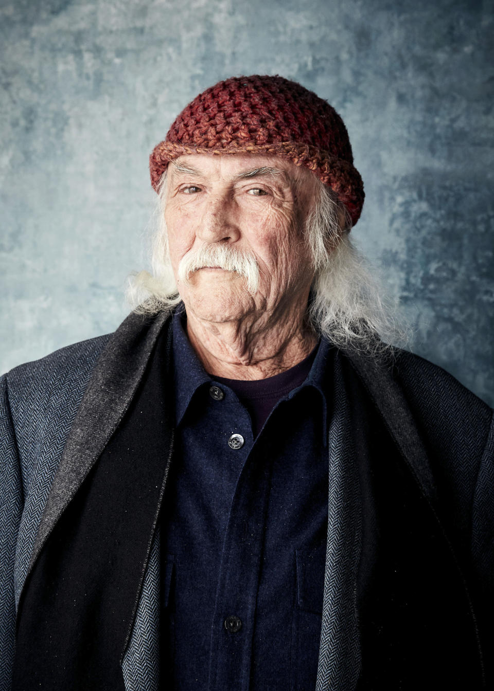 FILE - In this Jan. 26, 2019 file photo, David Crosby poses for a portrait to promote the film "David Crosby: Remember My Name" at the Salesforce Music Lodge during the Sundance Film Festival in Park City, Utah. Crosby offers candid reflections on his career, relationships and feuds with others in the new documentary, which will be in limited release on Friday, July 19, 2019, and expand to additional theaters in the coming weeks. (Photo by Taylor Jewell/Invision/AP, File)
