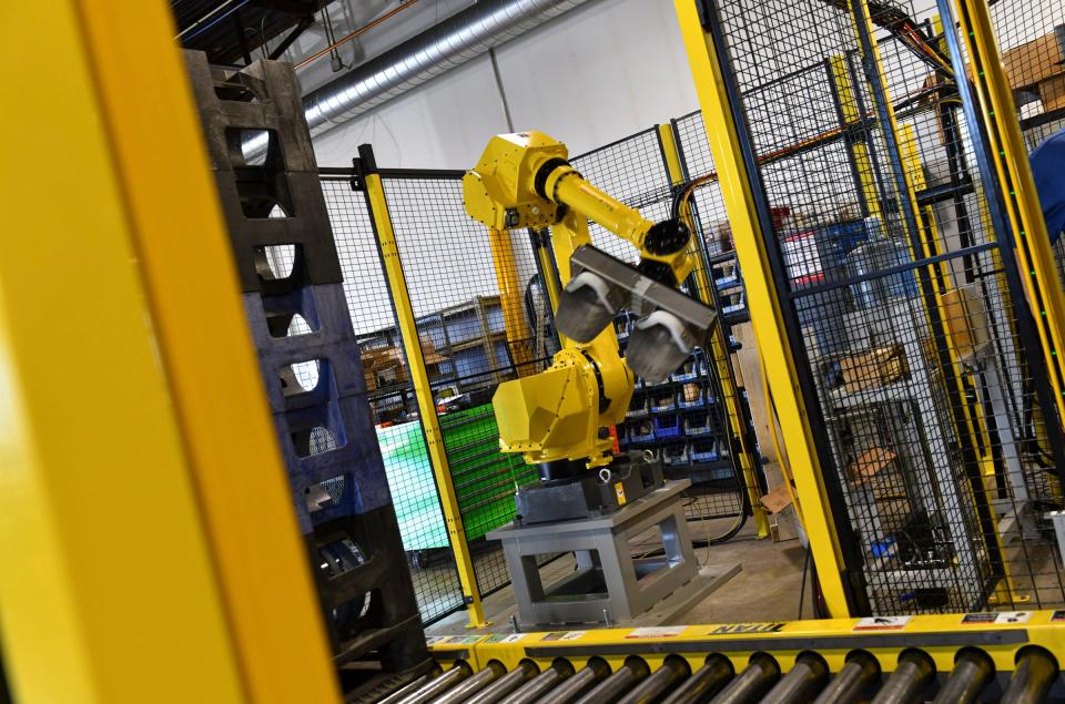 A robot runs through testing tasks Monday March 29, 2021, at Central McGowan in St. Cloud.