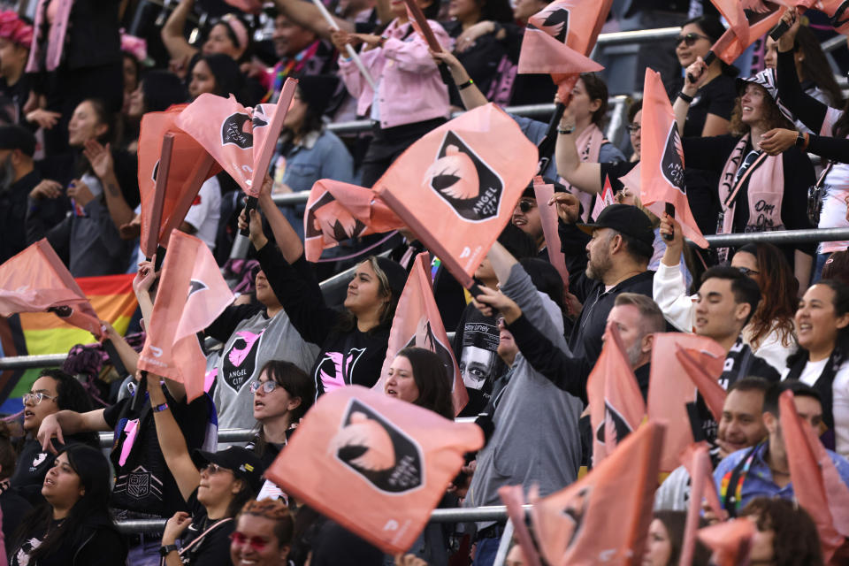 Angel City supporters cheer on their team at a game in March. (Katharine Lotze/Getty Images)