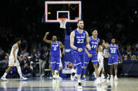 Seton Hall's Sandro Mamukelashvili (23), Quincy McKnight (0), Jared Rhoden (14) and Myles Cale (22) celebrate after an NCAA college basketball game against Villanova, Saturday, Feb. 8, 2020, in Philadelphia. (AP Photo/Matt Slocum)