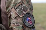 <p>Many members of self-described patriot groups and militias wore patches during III% United Patriots’ Field Training Exercise outside Fountain, Colo., July 29, 2017. (Photo: Jim Urquhart/Reuters) </p>