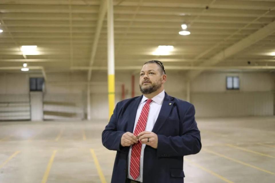 Chris Murphy, NEMCC’s vice president of finance, discusses plans for an empty furniture warehouse the college hopes to turn into a hub for its career-technical programs last month. Molly Minta/Mississippi Today
