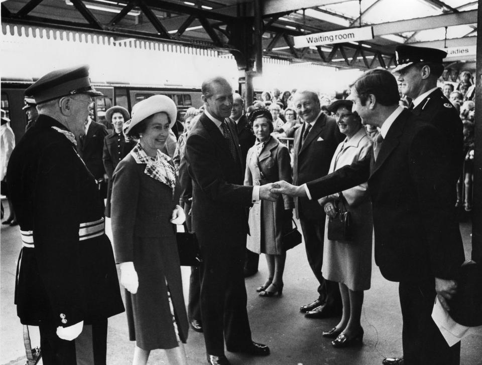 Mr Keith Ricketts, Station Manager, presented Queen Elizabeth and the Duke of Edinburgh at Portsmouth Harbour Station 1977. (Photo: The News archive)