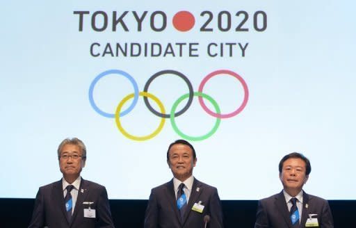 Members of the delegation of Tokyo 2020 Candidate City pose on July 3, 2013 in Lausanne. The leaking of toxic water from the stricken Fukushima nuclear plant will not affect Tokyo, the head of bid Tsunekazu Takeda told AFP