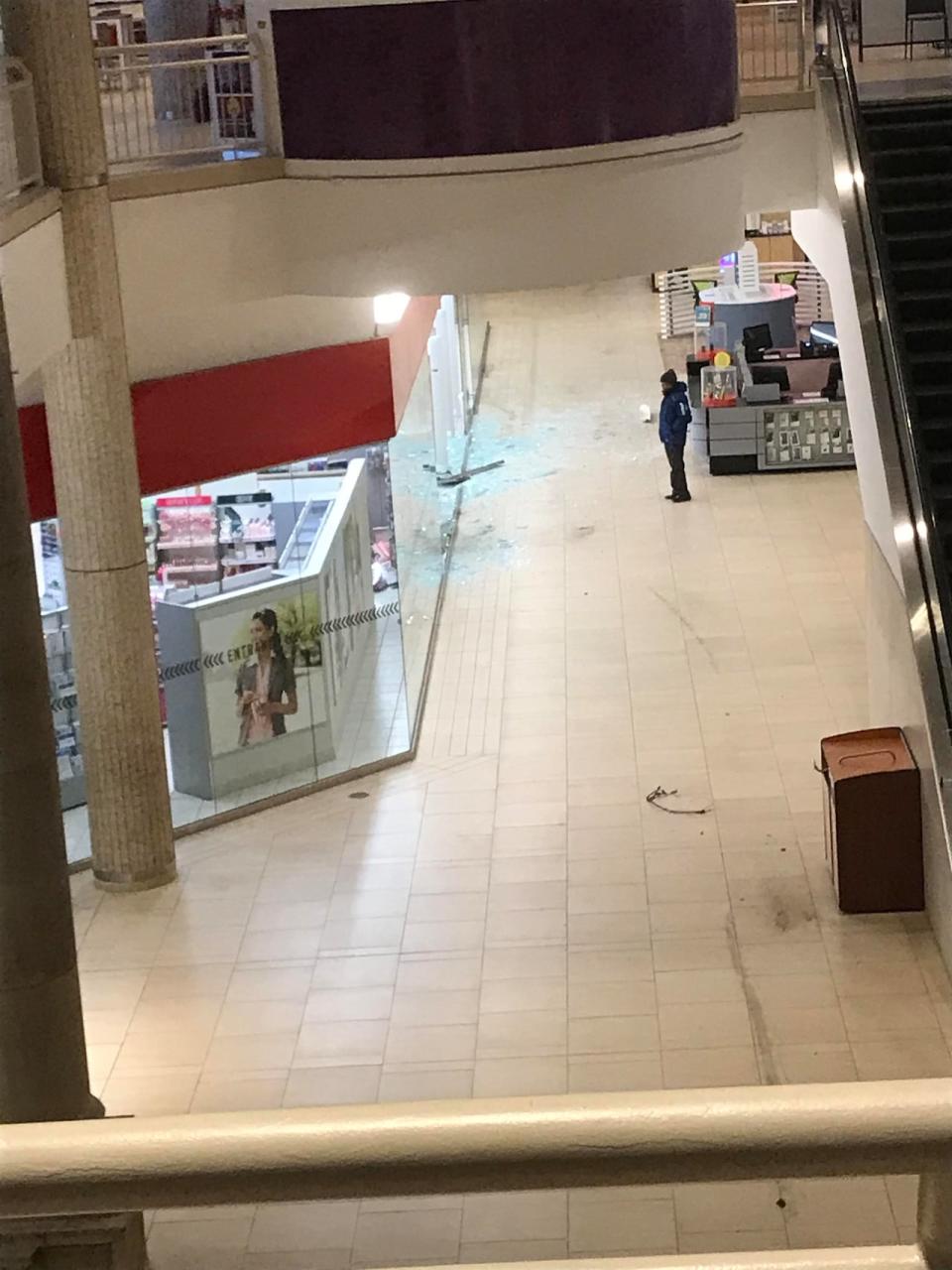 Damage from inside the Cornwall Centre is shown in a photo sent to CBC by a woman who says her son works a night shift at the Cornwall Centre. Regina police the driver of a stolen cab crashed into multiple businesses, including the downtown mall, early on the morning of Saturday, Dec. 16, 2023.