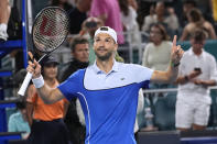 Grigor Dimitrov, of Bulgaria, celebrates after defeating Alexander Zverev, of Germany, in the semifinals of the Miami Open tennis tournament Friday, March 29, 2024, in Miami Gardens, Fla. (AP Photo/Marta Lavandier)