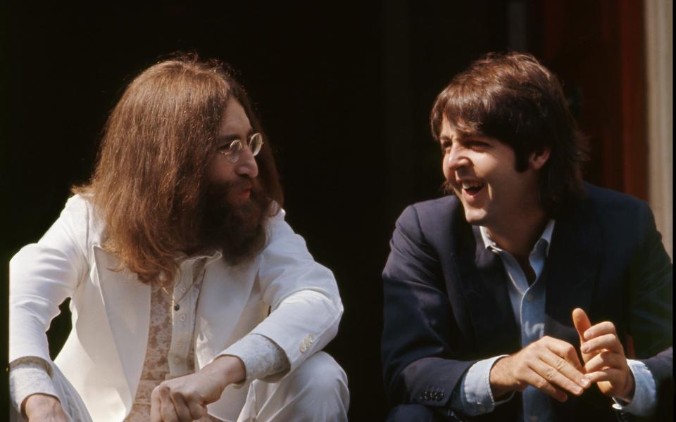 McCartney with John Lennon during the Abbey Road cover shoot, 1969 - Linda McCartney
