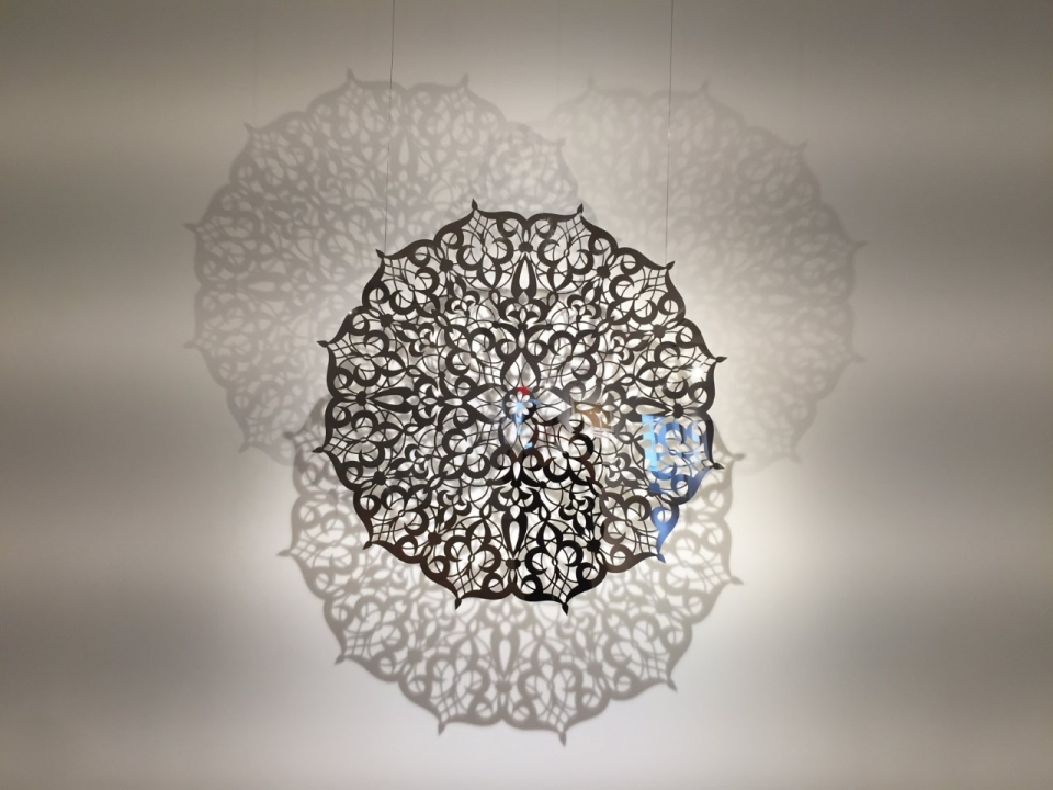 Anila Quayyum Agha, Teardrop (After Robert Irwin), 2016, polished stainless steel with mirror finished, halogen lighting, ed. 2/8, 46” diameter; Courtesy of Talley Dunn Gallery, Dallas, Texas.