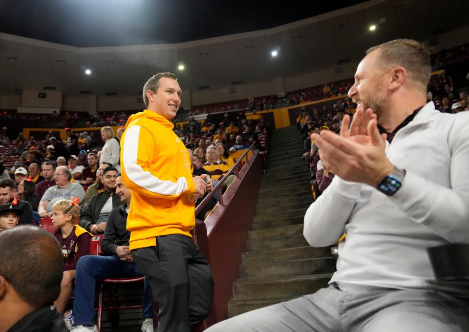 Dec 4, 2022; Tempe, Arizona, USA;  Arizona State head football coach Kenny Dillingham is greeted by fans during Pac-12 basketball play between Arizona State and Stanford at Desert Financial Arena.