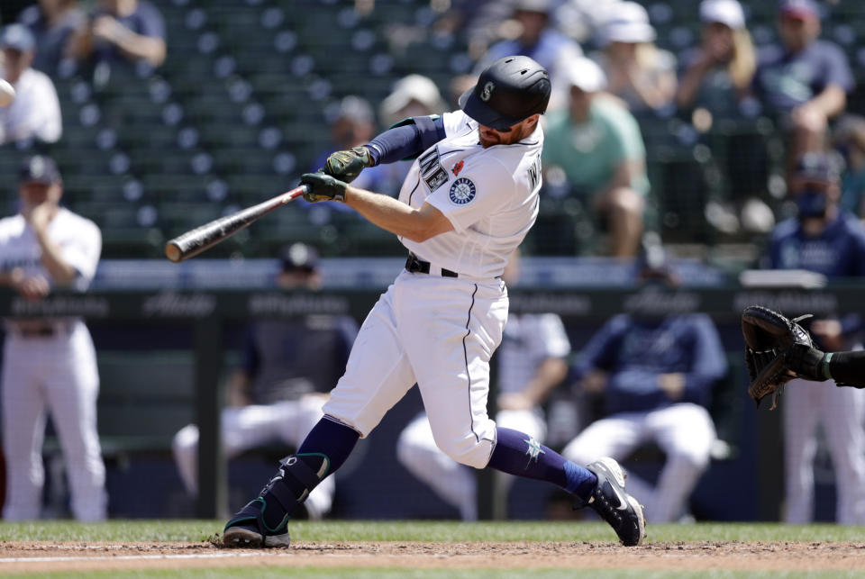 Seattle Mariners' Donovan Walton hits a three-run home run during the fourth inning of a baseball game, Monday, May 31, 2021, in Seattle. (AP Photo/John Froschauer)