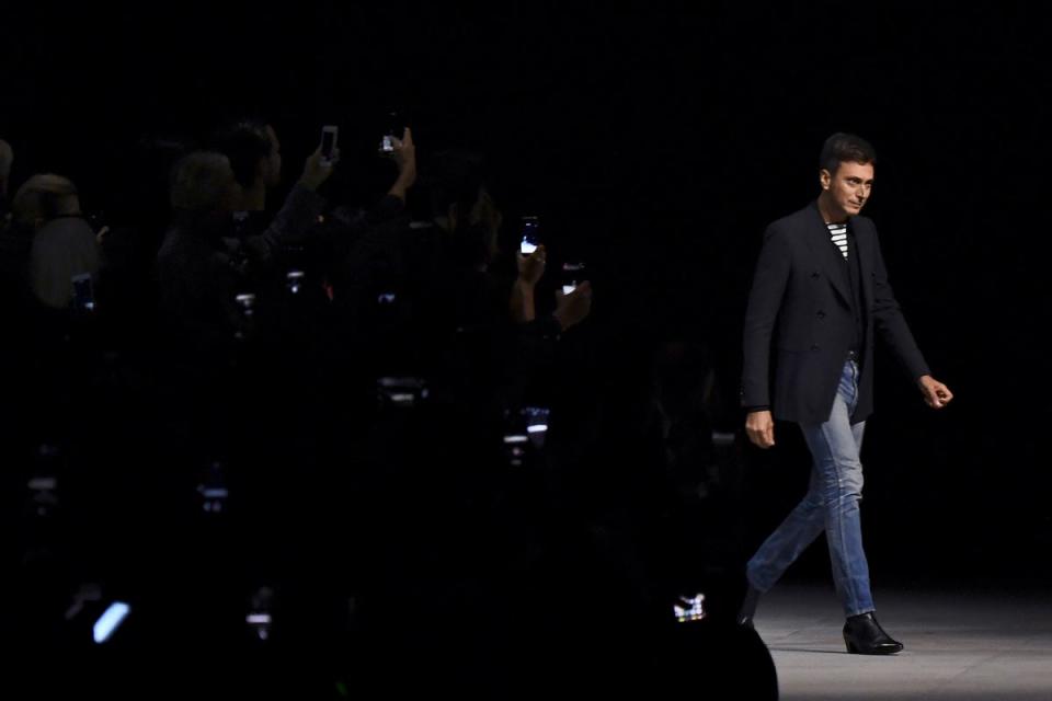 French fashion designer for Celine Hedi Slimane acknowledges the audience at the end of the Celine Spring-Summer 2019 Ready-to-Wear collection fashion show in Paris, on September 28, 2018 (AFP via Getty Images)