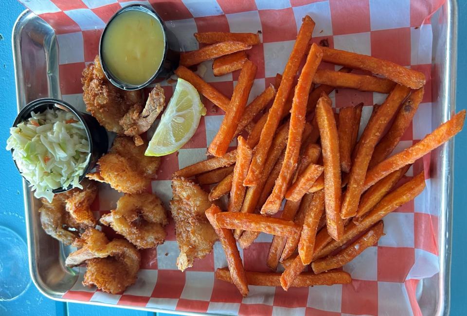 At Skippers Cove Bar & Grill in Fort Pierce, the six pieces of coconut shrimp were coated in breading and coconut flakes and then deep fried. The rich, sweet dipping sauce was a combination of orange marmalade and Grand Marnier.