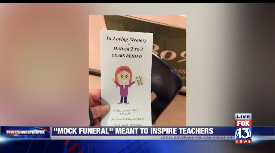 The “funeral” included a memorial card to “Madam 2 to 3 years behind.” (Screenshot: Fox 13)