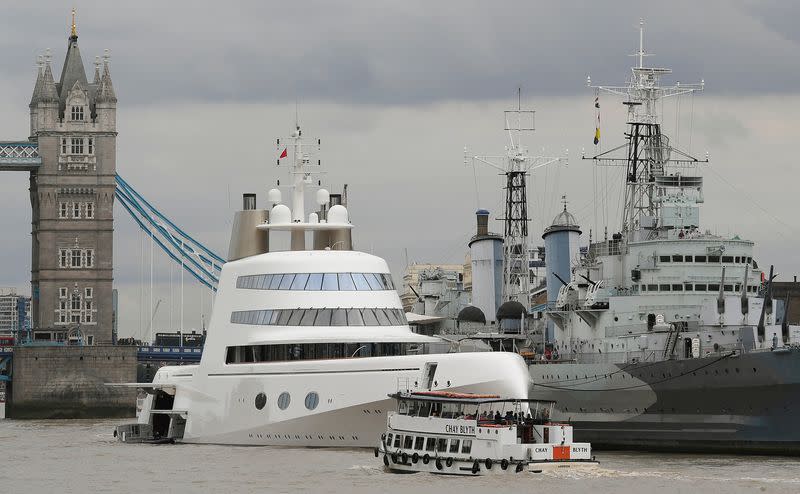 FILE PHOTO: Superyacht "Motor Yacht A", owned by Russian tycoon Andrey Melnichenko, is seen moored on the River Thames besides HMS Belfast in London