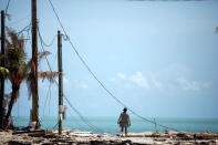 Lora Castelo stands at a trailer park were her home used to be in Islamorada after Hurricane Irma struck Florida, in Islamorada, U.S., September 12, 2017. REUTERS/Carlos Barria