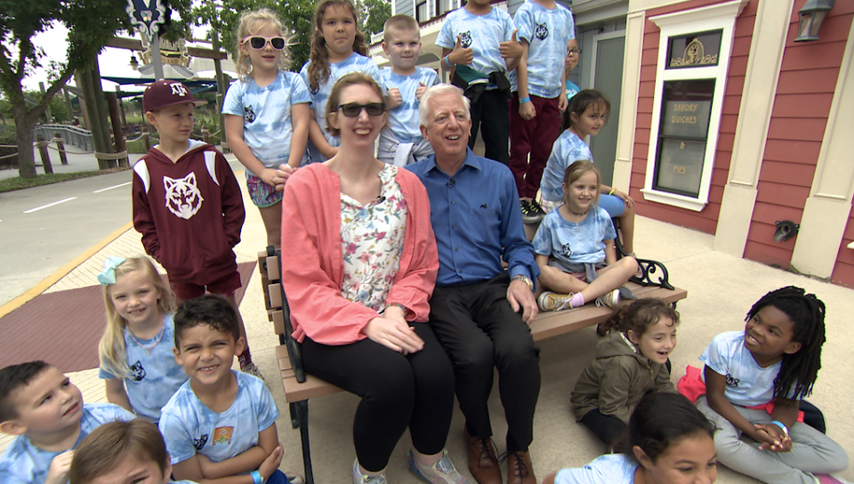 Kids visiting the theme park on a field trip wanted to meet Morgan and her dad. / Credit: CBS News