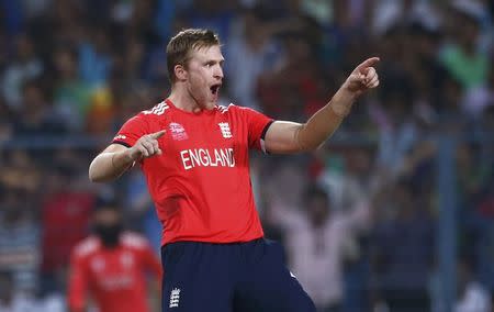 Cricket - England v West Indies - World Twenty20 cricket tournament final - Kolkata, India - 03/04/2016. England's David Willey celebrates taking the wicket of West Indies Andre Russell. REUTERS/Adnan Abidi