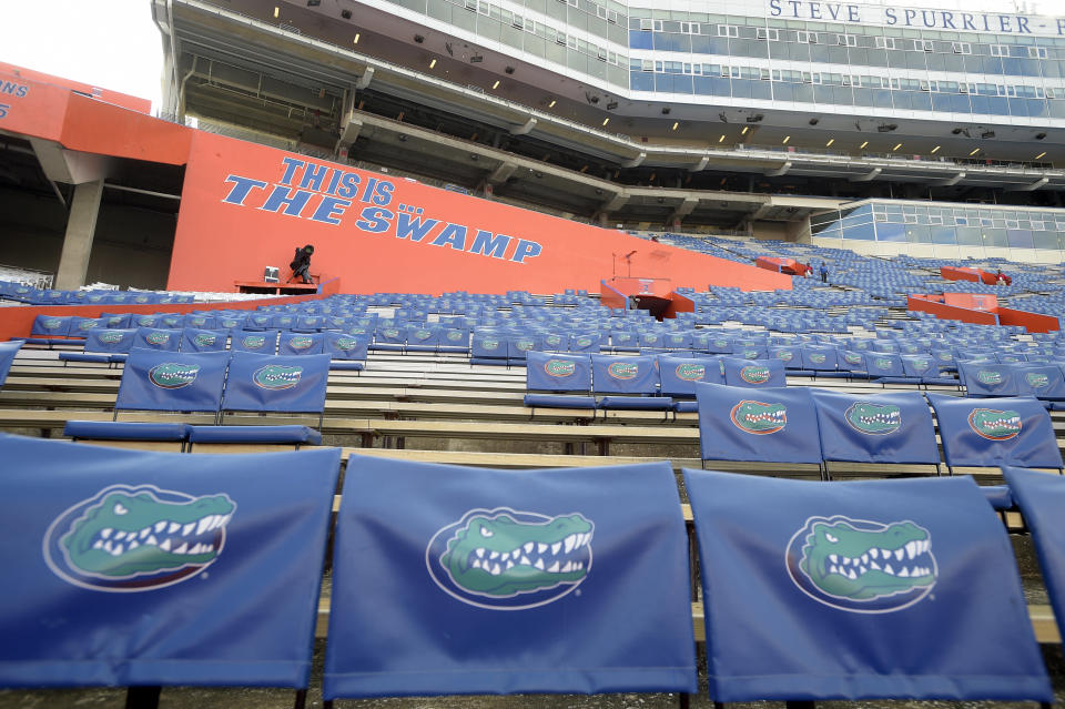 Florida Gator seat backs sit in the stands of Ben Hill Griffin Stadium before an NCAA college football game against North Texas in Gainesville, Fla., Saturday, Sept. 17, 2016. (AP Photo/Phelan M. Ebenhack)