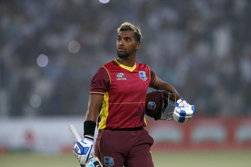 West Indies' Nicholas Pooran walks back to the pavilion after his dismissal during the third one day international cricket match between Pakistan and West Indies at the Multan Cricket Stadium, in Multan, Pakistan, Sunday, June 12, 2022. (AP Photo/Anjum Naveed)