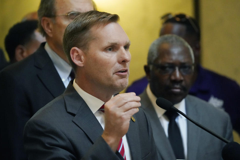 FILE - Rep. Michael Guest, R-Miss., speaks as he stands with a delegation of state elected officials May 4, 2022, in Jackson, Miss. Guest is facing Michael Cassidy, a former Navy fighter pilot, in a runoff primary election June 28, as he seeks a third term. (AP Photo/Rogelio V. Solis, File)