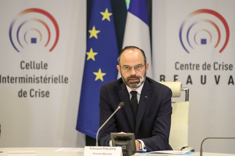 French Prime Minister Edouard Philippe chairs a video meeting with French regions prefects on the coronavirus in the "crisis room" of the French Interior ministry in Paris