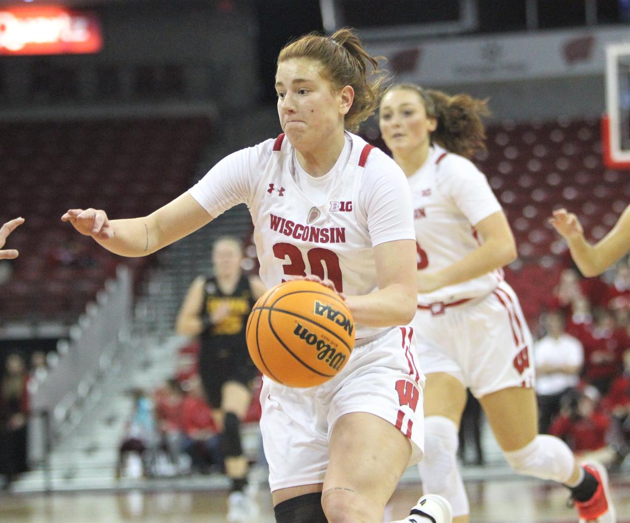 Wisconsin basketball player Sydney Hilliard drives to the basket during the team's game against Iowa at the UW Kohl Center in Madison, Wis. on Sunday Dec. 4, 2022.