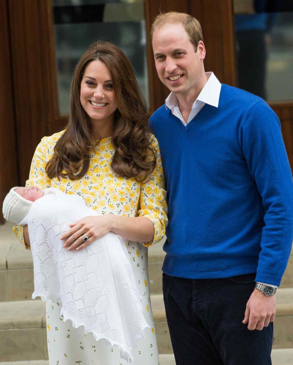 Prince William, Duke of Cambridge and Catherine, Duchess of Cambridge depart the Lindo Wing with their new baby at St Mary's Hospital on May 2, 2015 in London, England