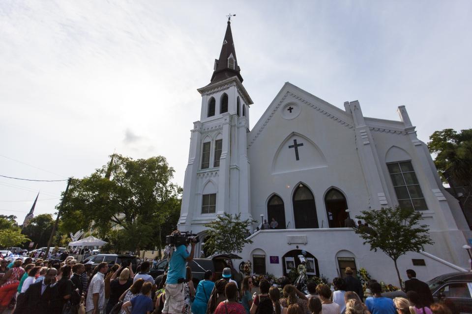 Mourners gather in front of Emanuel African Methodist Episcopal Church,where Dylann Roof murdered nine black people.&nbsp;"In most countries, when there have been big changes in gun laws, it was because of mass shootings," Harvard University professor David Hemenway said. Not so in the U.S. (Photo: Anadolu Agency via Getty Images)