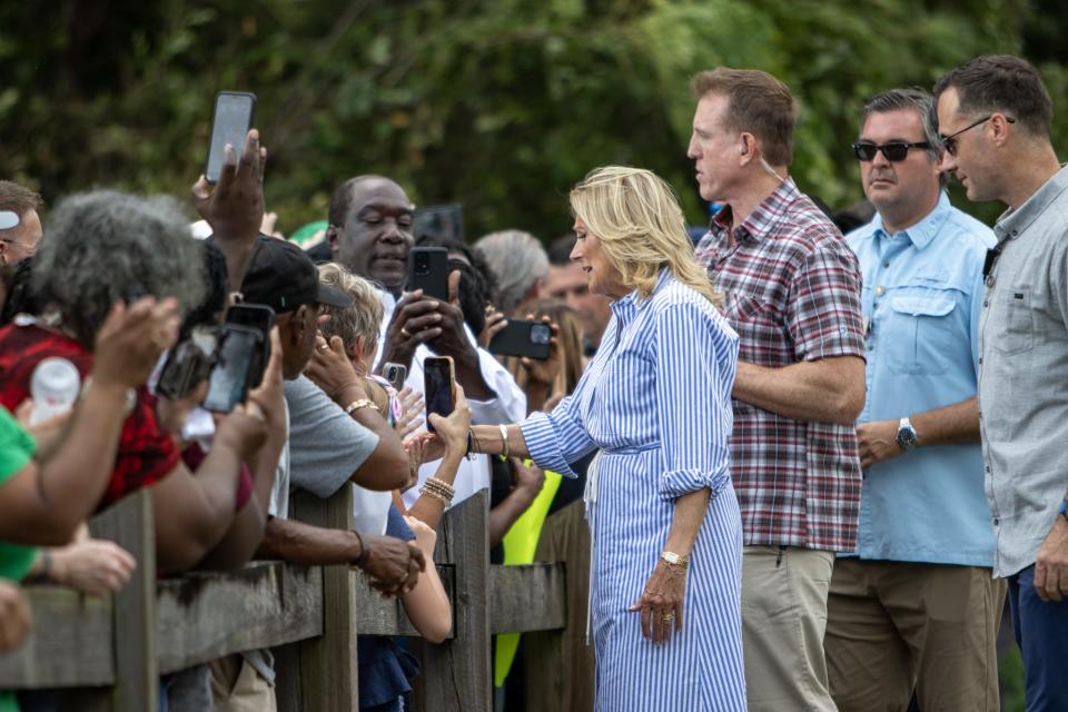 First lady Jill Biden greets people in Live Oak on Saturday. She and the president visited the town to assess Hurricane Idalia damage and speak to the community.