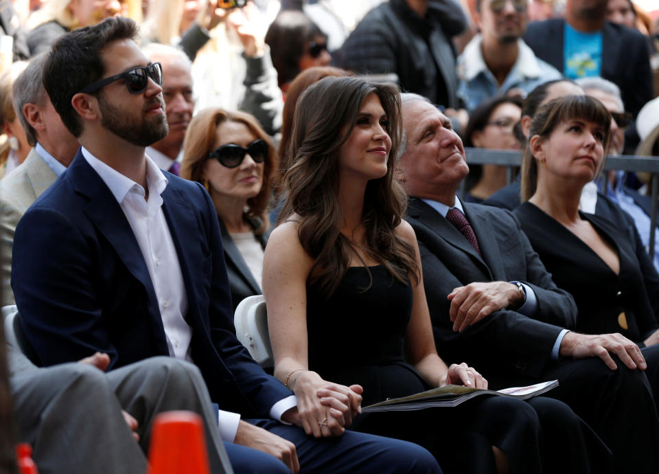 <p>James and Jessica Altman watch their mother actor Lynda Carter (not pictured) before the unveiling of her star on the Hollywood Walk of Fame in Los Angeles, California, U.S., April 3, 2018. REUTERS/Mario Anzuoni </p>