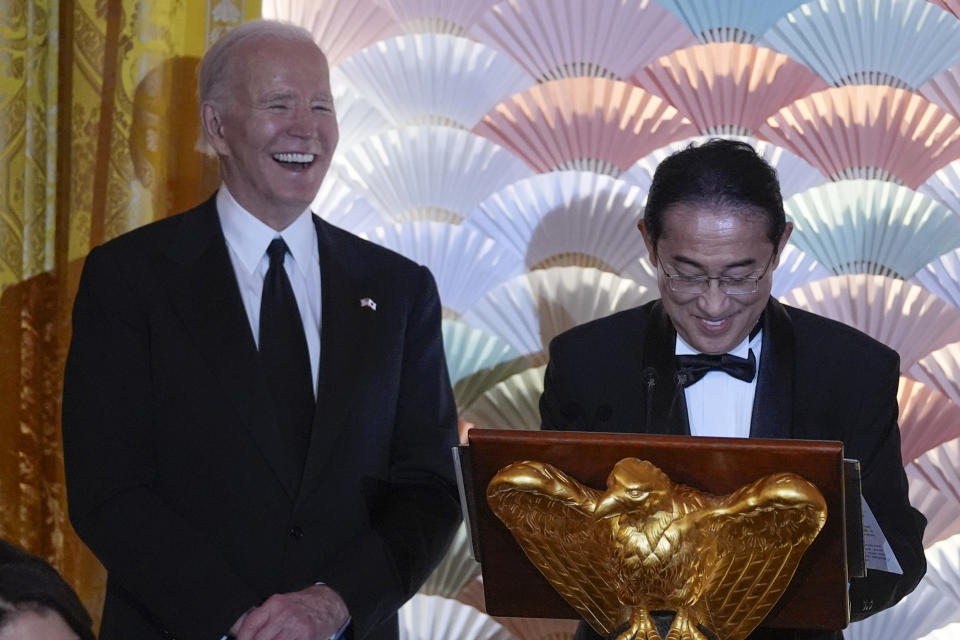 President Joe Biden listens as Japanese Prime Minister Fumio Kishida speaks ahead of a toast during a State Dinner at the White House, Wednesday, April 10, 2024, in Washington. (AP Photo/Evan Vucci)