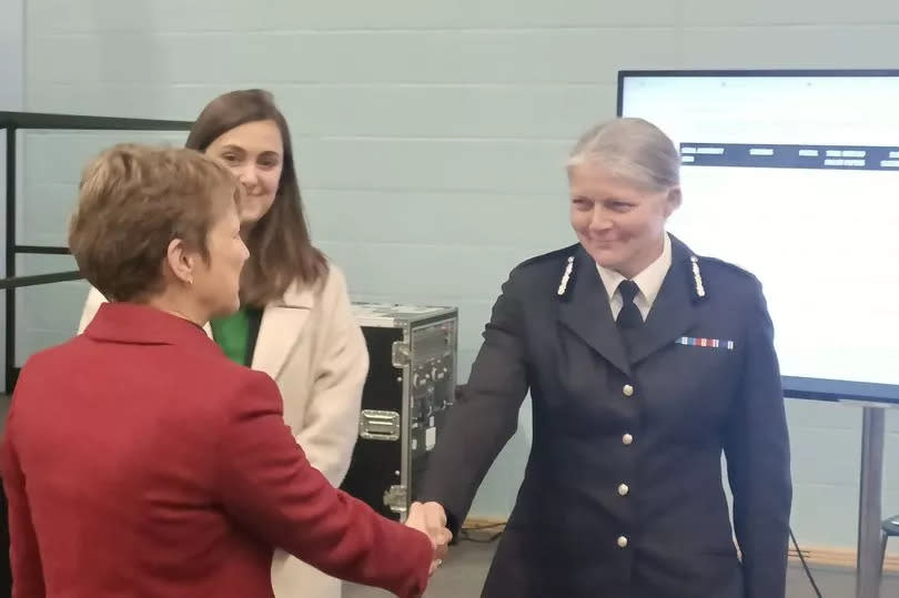 Clare Moody shakes hands with Chief Constable Sarah Crew