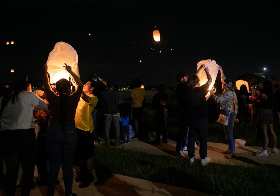 Friends, family and members of the community set off lanterns on Thursday night, June 29, 2023, in remembrance of the five teenagers who died on Sunday night or Monday morning when their car crashed into a Fort Myers pond. The memorial and vigil were held at the Texas Roadhouse restaurant where four of them worked.