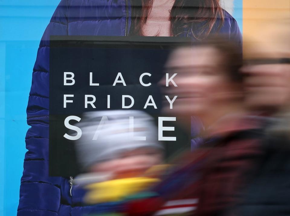 A shop displaying offer posters ahead of Black Friday sales (PA) (PA Wire)