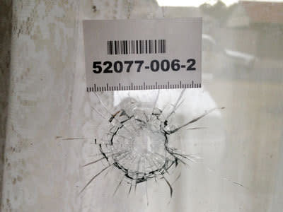 <p>The bullet hole in the window of the Enfield home. Photo: Lloyd Thornton, 7News.</p>