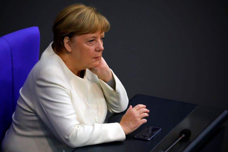 German Chancellor Angela Merkel attends a session of the Bundestag, in Berlin