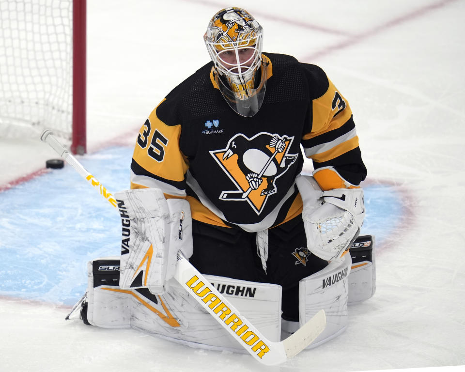 A shot by Buffalo Sabres' Alex Tuch gets behind Pittsburgh Penguins goaltender Tristan Jarry for a goal during the first period of an NHL hockey game in Pittsburgh, Saturday, Jan. 6, 2024. (AP Photo/Gene J. Puskar)