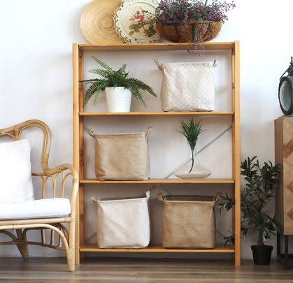 This pair of square jute and linen storage baskets