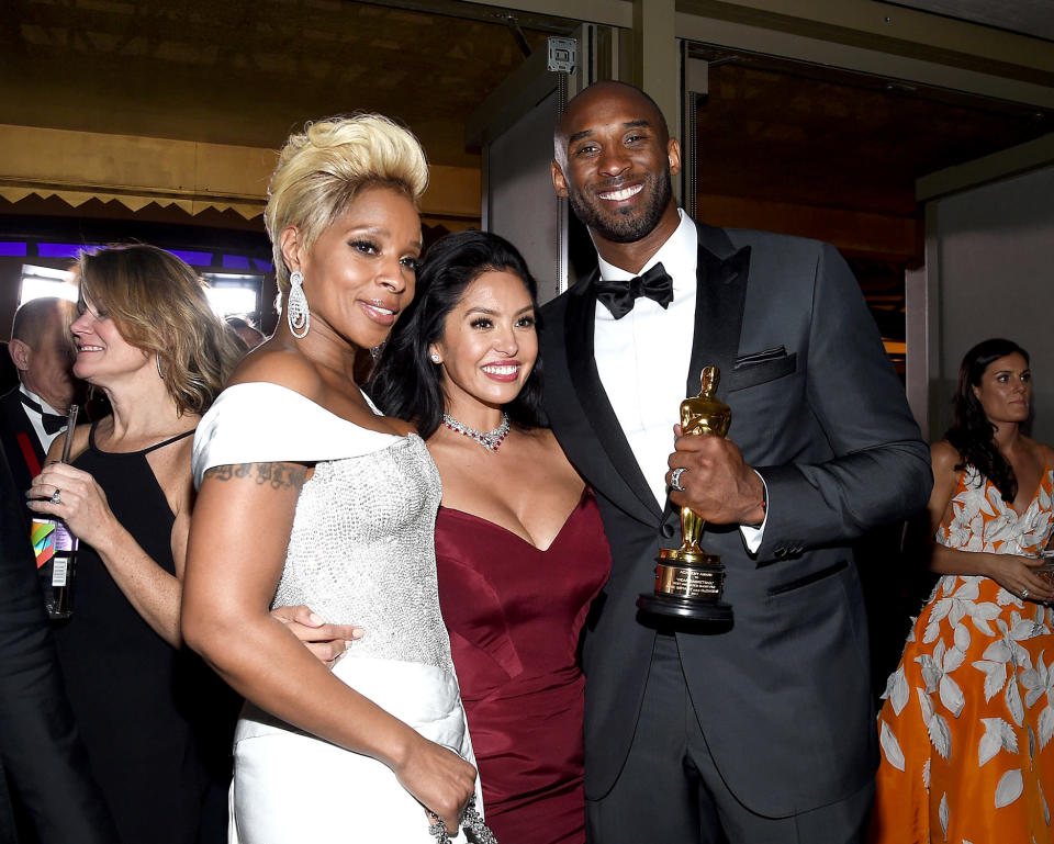 <p>Though she didn’t take home an Oscar for Best Supporting Actress, Blige helped Bryant and his wife Vanessa celebrate his big win for Best Animated Short at the Governors Ball. (Photo: Kevork Djansezian/Getty Images) </p>