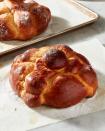 <p>Pillowy soft and fragrant with anise and orange flower water, this Mexican sweet bread is eaten during the weeks around Dia de Los Muertos (Day of the Dead).</p><p>Get the recipe from <a href="https://www.delish.com/holiday-recipes/a37262236/pan-de-muerto-recipe/" rel="nofollow noopener" target="_blank" data-ylk="slk:Delish" class="link ">Delish</a>.</p>