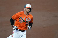 Baltimore Orioles' Trey Mancini runs the bases after hitting a solo home run off Boston Red Sox starting pitcher Garrett Richards during the first inning of a baseball game, Saturday, April 10, 2021, in Baltimore. (AP Photo/Julio Cortez)