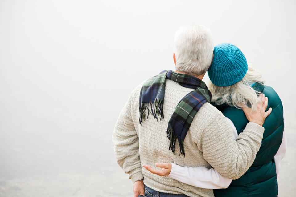 Older adult couple facing away from the camera