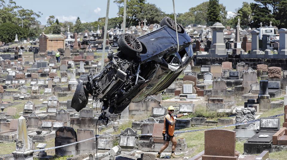 As many as 15 graves were damaged when the Mercedes came crashing down. Source: AAP