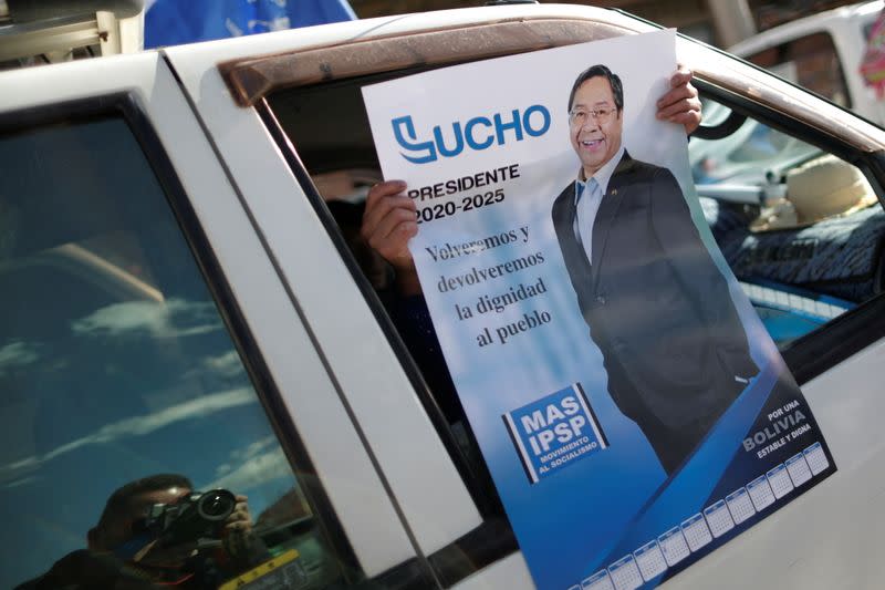 Supporters of the Movement to Socialism party (MAS) attend a rally a day after nationwide election in El Alto