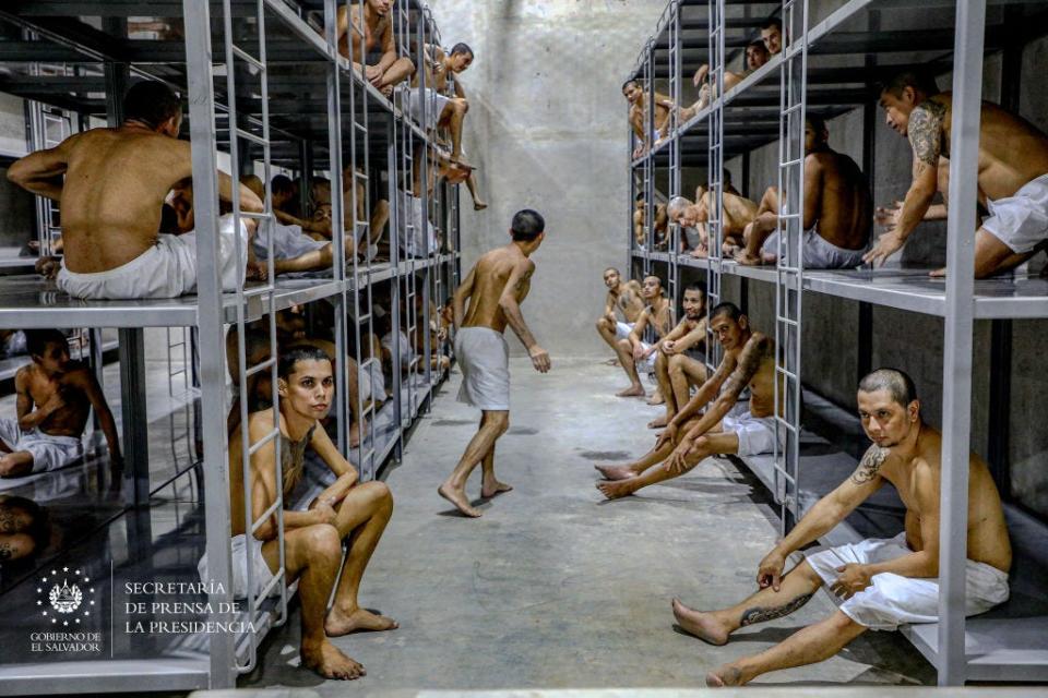 Dozens of inmates inside of a mega-prison.